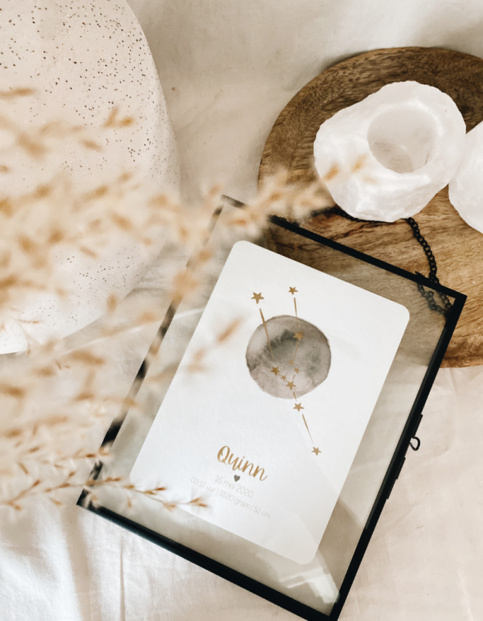 sterrenbeeldkaart in aquarelprint in zwart metalen lijst